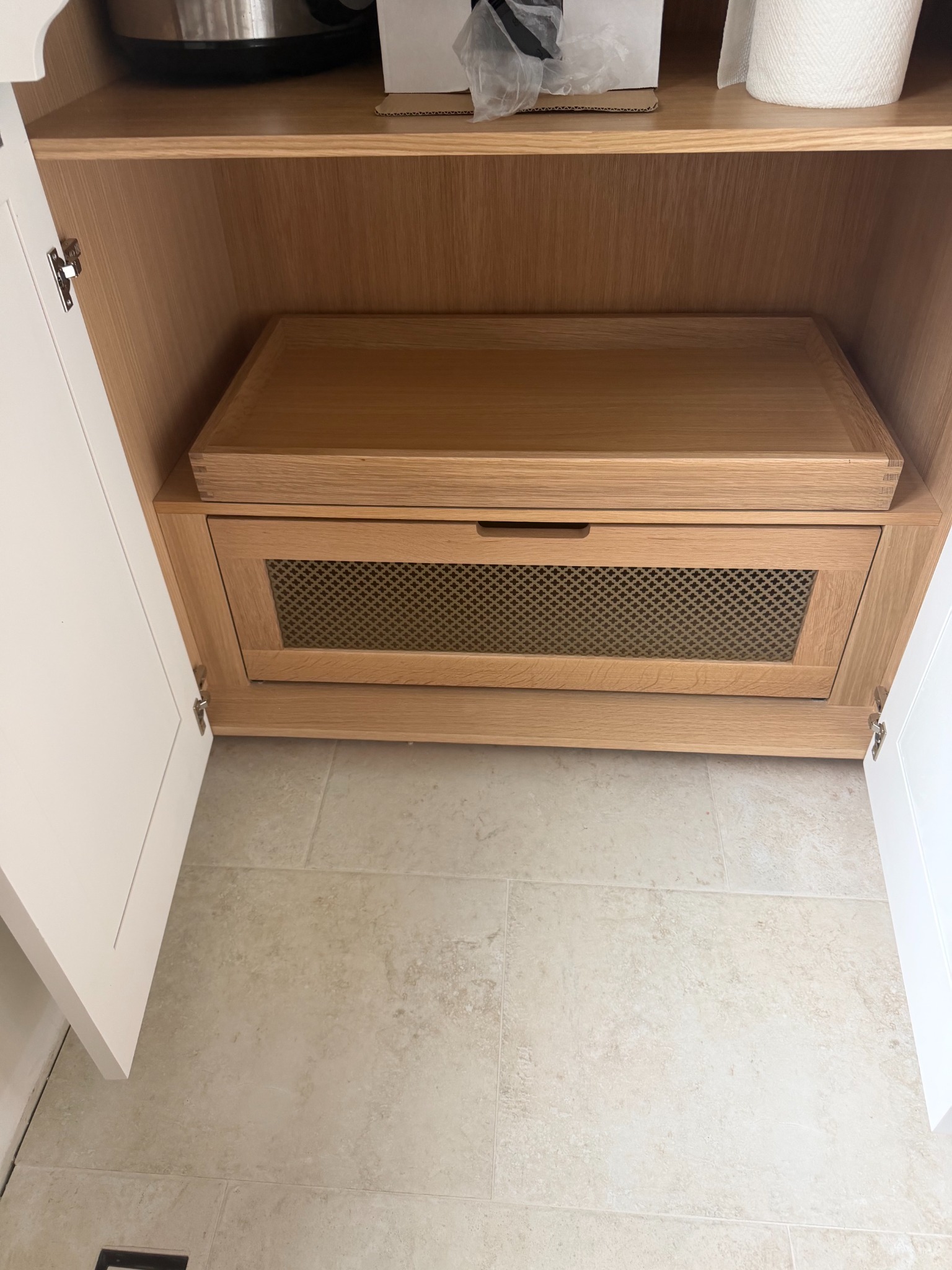 Natural oak cabinet interior with fitted tray and ventilated drawer