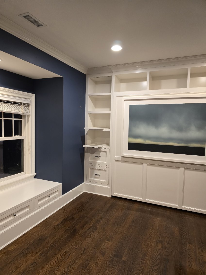 Completed Watermill room with coordinated Murphy bed cabinetry and window seat